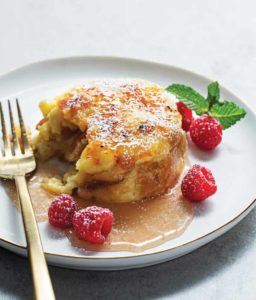 Sous-Vide Bread Pudding on plate with raspberries