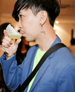 Asian man drinking "It's Sous Vide's Thyme," an inventive cocktail served in Bangkok during International Sous Vide Day 2019.